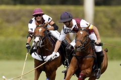 Dutta Corp's Timmy Dutta reaches for the hook on Pilot's Facundo Pieres ©United States Polo AssociationDavid Lominska